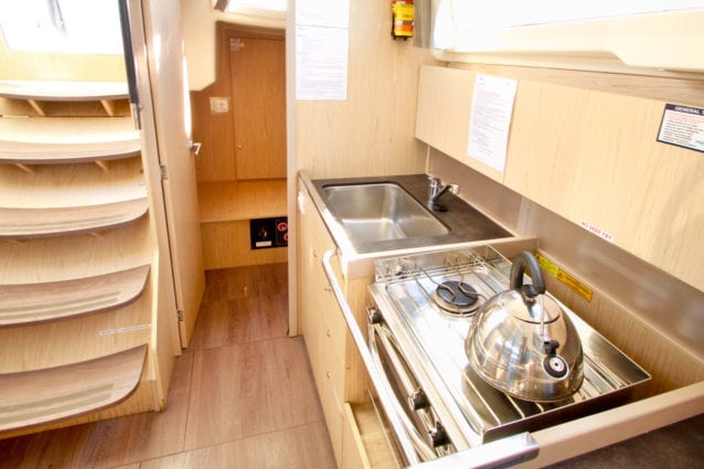 Whitsunday Escape sailing yacht Beneteau 411 galley and stairway