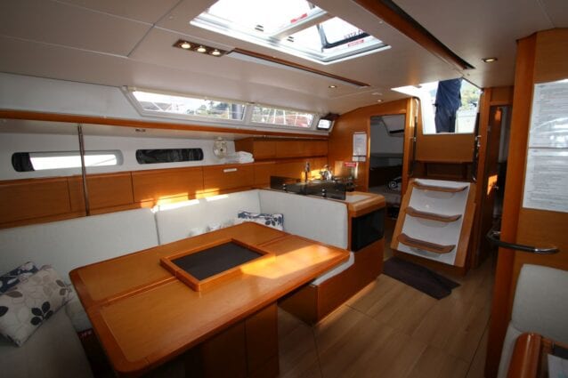 Jeanneau 43 Saloon and Galley saloon table extended