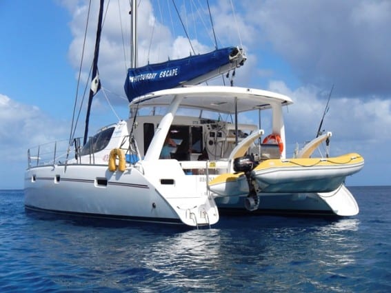 Whitsunday Escape Leopard 40 on water at anchor bareboat charter sailing catamaran