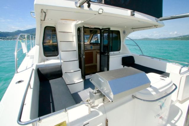 Whitsunday Escape Voyager 1040 Power Catamaran Cockpit BBQ Port from Rear 1500