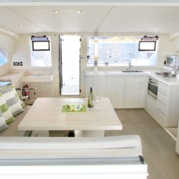 https://whitsundayescape.com.au/wp-content/uploads/2016/05/Whitsunday-Escape-Leopard-401-saloon-galley-and-forward-door.jpg