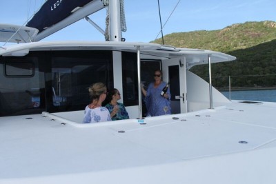 Whitsunday Escape Leopard 44 sailing catamaran cockpit fwd sunset drinks
