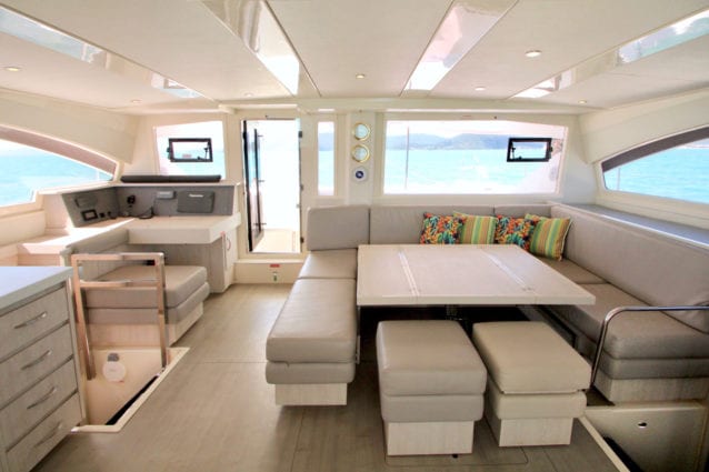 Whitsunday Escape Leopard 48 saloon dining and nav tablejpg