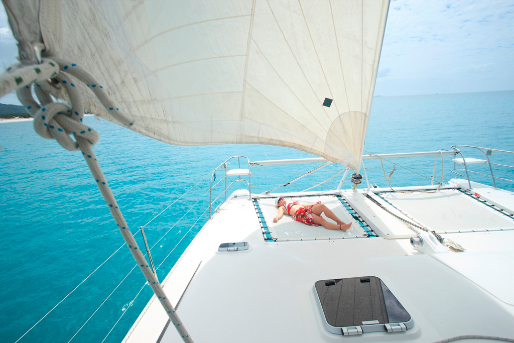 Whitsunday Escape bareboat sailing holioday sunbathing front catamaran islands