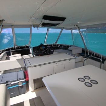 Whitsunday Escape Aquila 44 Power Catamaran Flybridge Helm and Table
