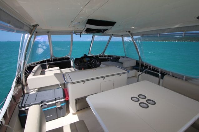 Whitsunday Escape Aquila 44 Power Catamaran Flybridge Helm and Table