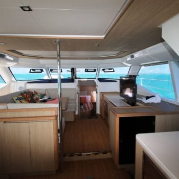 Whitsunday Escape Aquila 44 Power Catamaran Galley to Saloon with TV