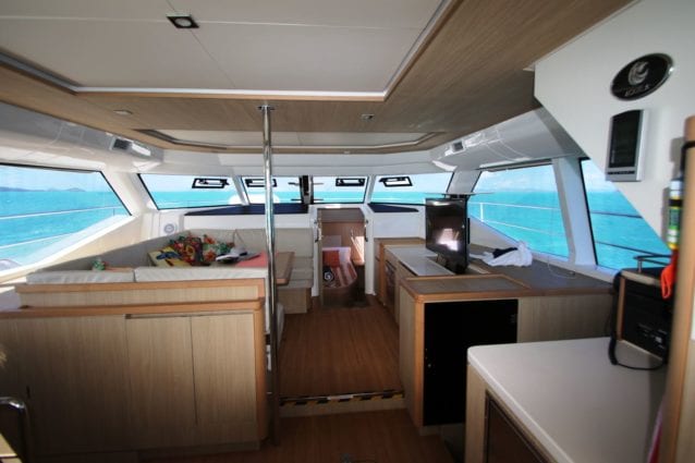 Whitsunday Escape Aquila 44 Power Catamaran Galley to Saloon with TV