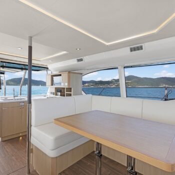 The inside of the Saloon of the Aquila 44.3 Power Catamaran