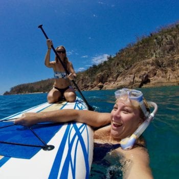 Go stand up paddling to stay fit while on bareboat holiday