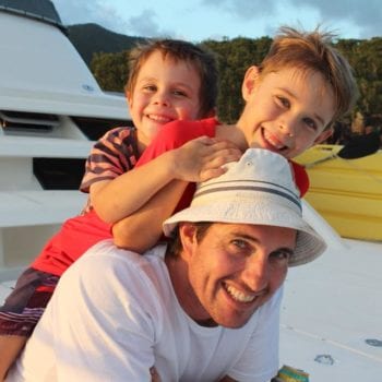 Dad and kids enjoying a fun family holiday with Whitsunday Escape