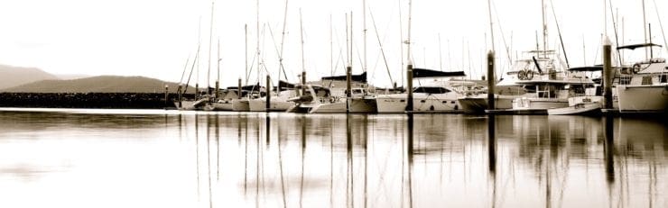 Abell Point Marina boats black and white Whitsunday Escape