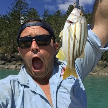 Fishing face. Fun to be had on your next whitsunday holiday with Whitsunday Escape™