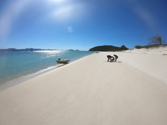 Family on Beach with Dinghy