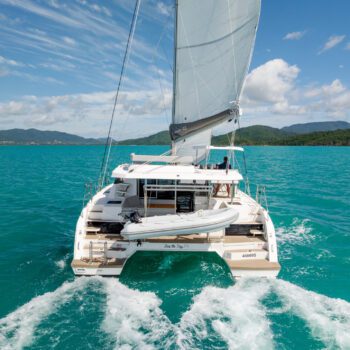 Seas The Day Leopard 42.3 Sailing Catamaran Under sail back view