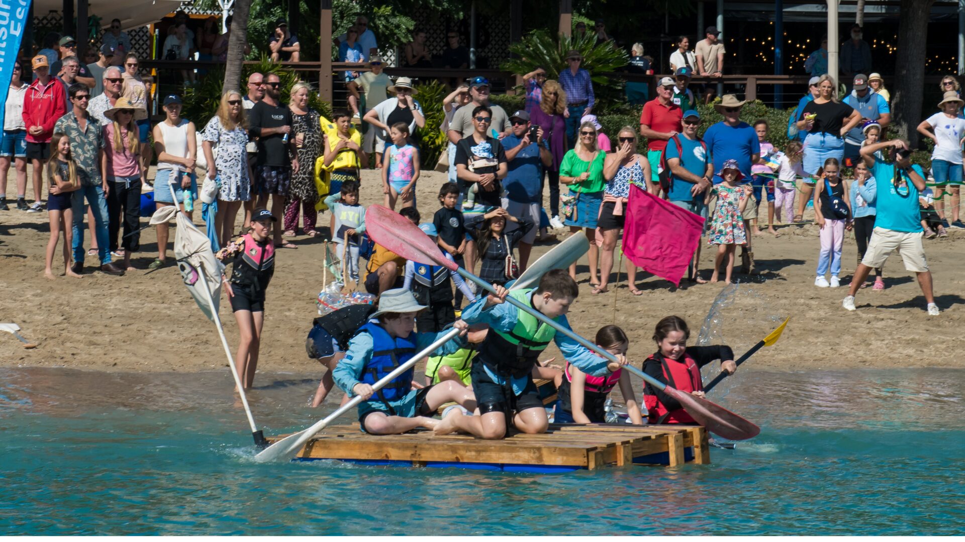 Kids on a raft at the Recyclable Regatta