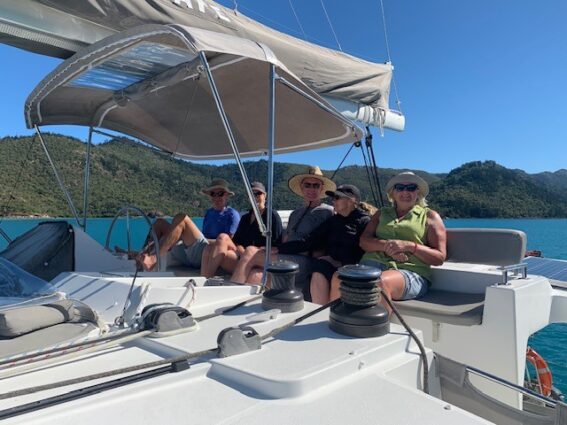Group of friends on the flybridge of our Lagoon 450.4